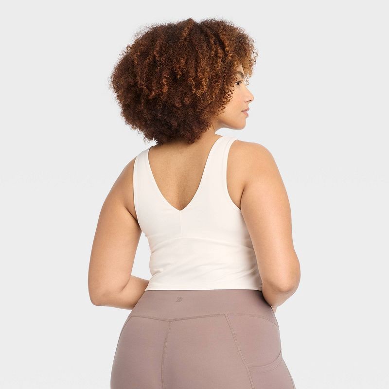 slide 3 of 4, Women's Flex Light Support V Neck Cropped Sports Bra - All In Motion™ Cream XXL: Built-in Shelf, Removable Padding, 1 ct