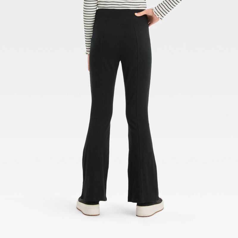 slide 2 of 3, Girls' Solid Flare Leggings - art class™ Black M: High Rise, Hidden Pocket, Midweight Jersey, 1 ct