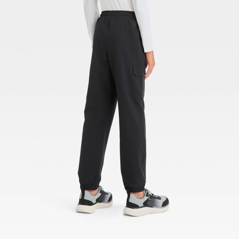 slide 2 of 3, Boys' Adventure Pants - All In Motion™ Black XL: Recycled Polyester, Spandex, Water Repellent, Cargo Pockets, Drawstring Waist, 1 ct