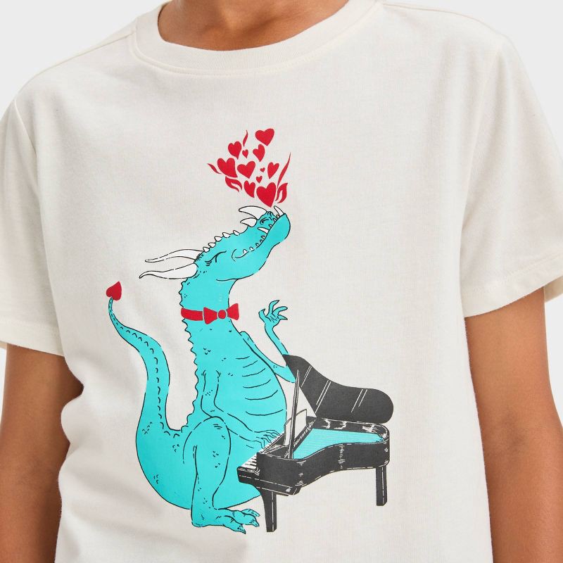 Tricou grafic Dragon care cântă la pianTricou grafic Dragon care cântă la pian  