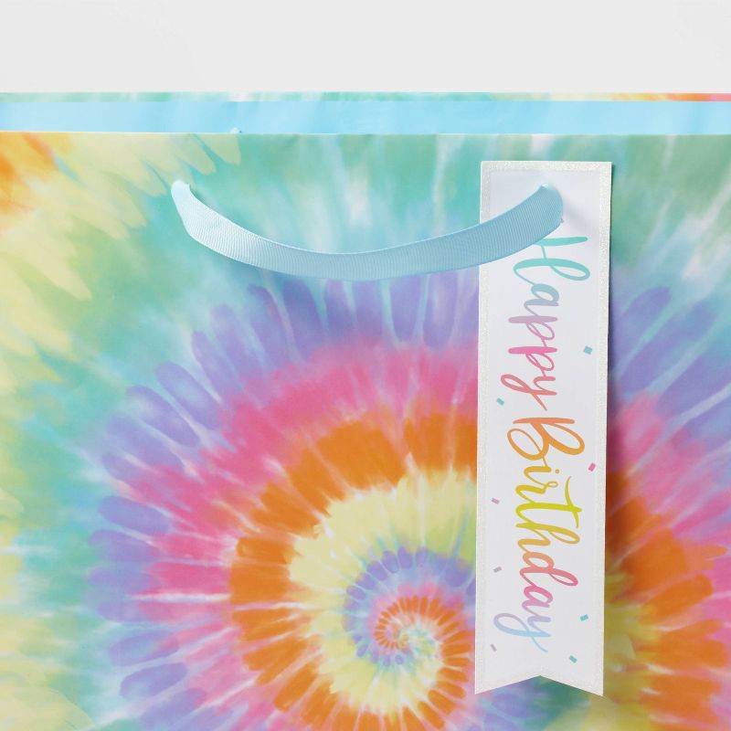 slide 3 of 3, Large Square Tie Dye Birthday Gift Bag - Spritz™: Multicolored Abstract Birthday Bag, Medium Size, 15"x15"x8", 1 ct