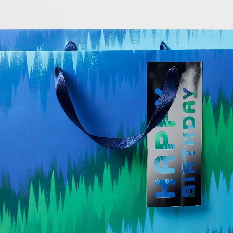 slide 3 of 3, XLarge Tie Dye Wave Birthday Gift Bag with Tag Blue/Green - Spritz™, 1 ct