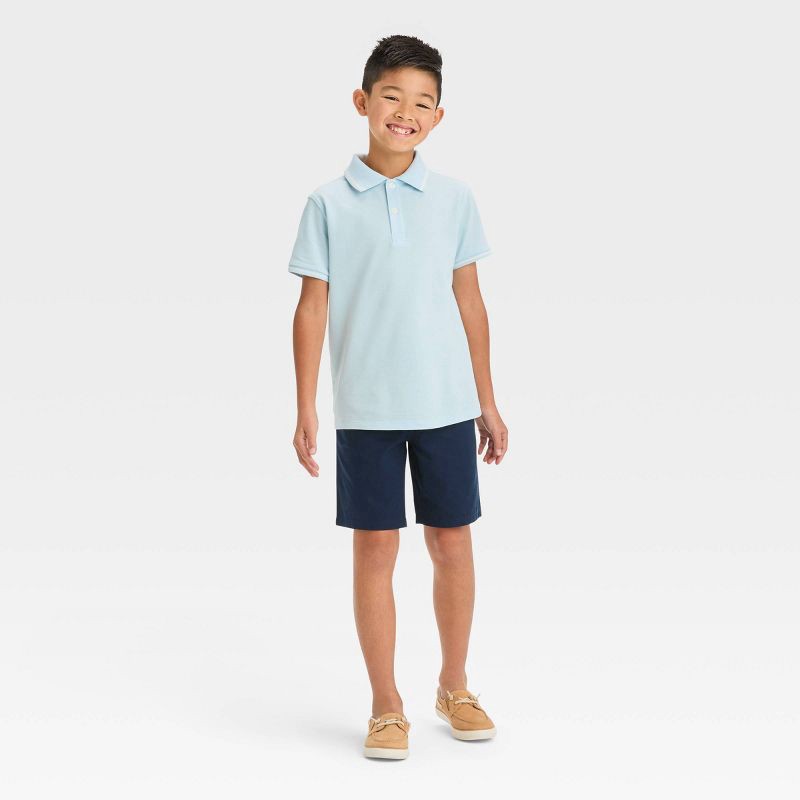 slide 3 of 3, Boys' Flat Front 'At the Knee' Chino Shorts - Cat & Jack™ Navy Blue 12: Cotton, Regular Fit, Adjustable Waistband, 1 ct