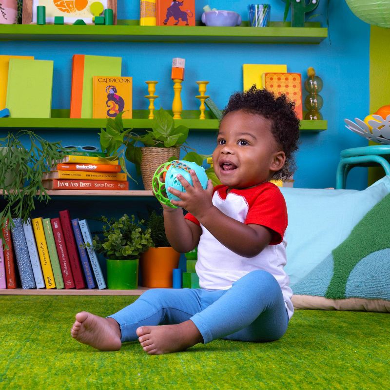 slide 2 of 9, Bright Starts Giggle & Glow Musical Light-Up Rattle Easy-Grasp Elephant, 1 ct