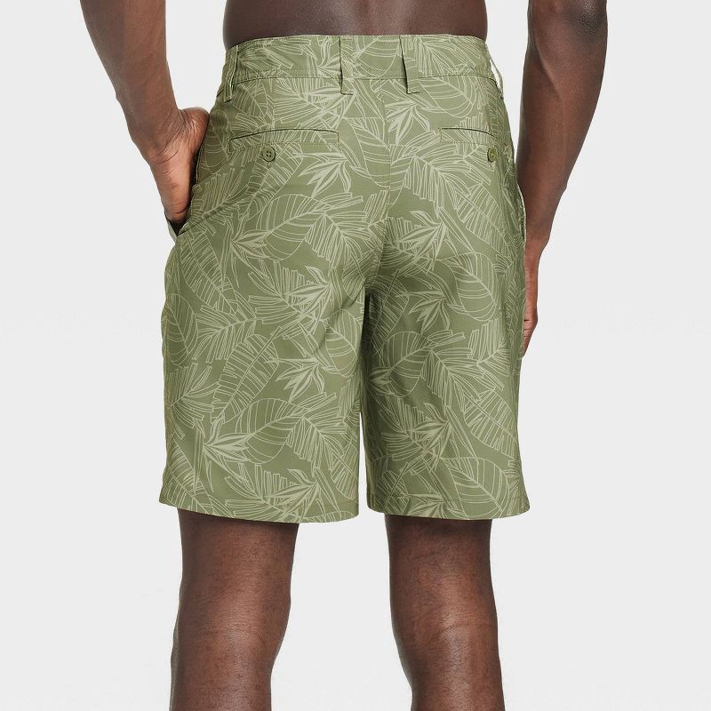 slide 2 of 3, Men's 9" Leaf Print Hybrid Swim Shorts - Goodfellow & Co™ Dark Green Leaf 42: Recycled Polyester, UPF 50+, 1 ct