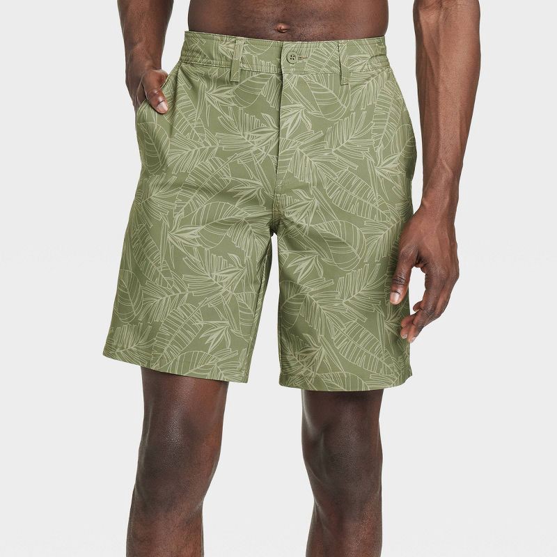 slide 1 of 3, Men's 9" Leaf Print Hybrid Swim Shorts - Goodfellow & Co™ Dark Green Leaf 42: Recycled Polyester, UPF 50+, 1 ct