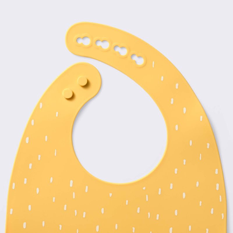 slide 3 of 4, Silicone Bibs - 2pk - Shapes/Yellow - Cloud Island™, 2 ct