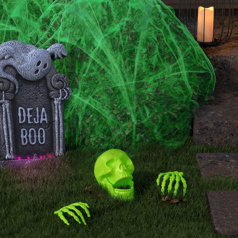 slide 2 of 3, 11' Stretchy Spiderweb Halloween Decorative Prop Glow in the Dark - Hyde and EEK! Boutique™, 1 ct