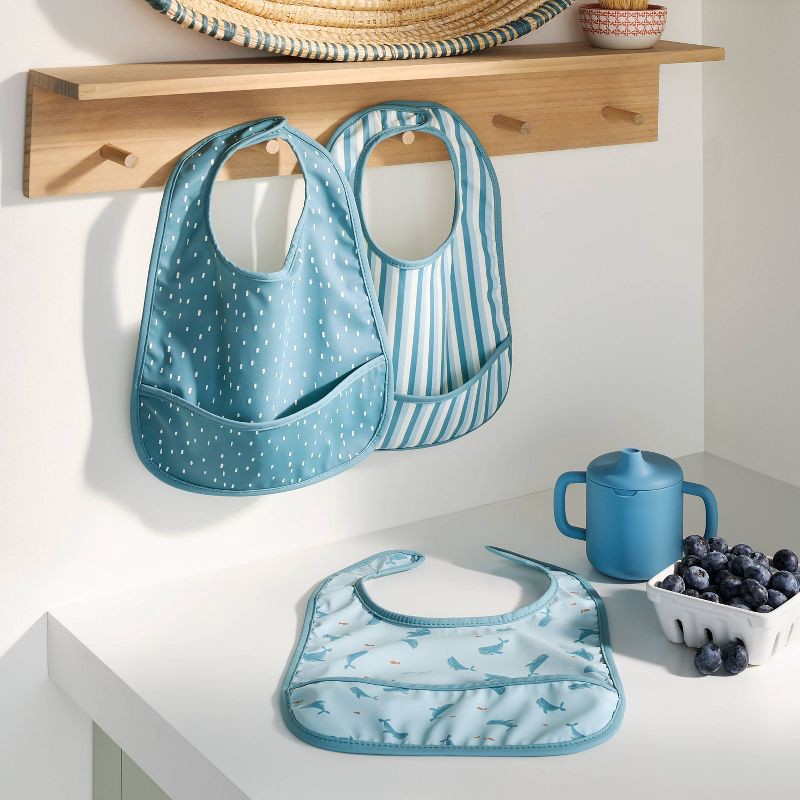 slide 2 of 4, Water-Resistant Bibs - 3pk - Whales/Stripes/Dots - Cloud Island™, 3 ct