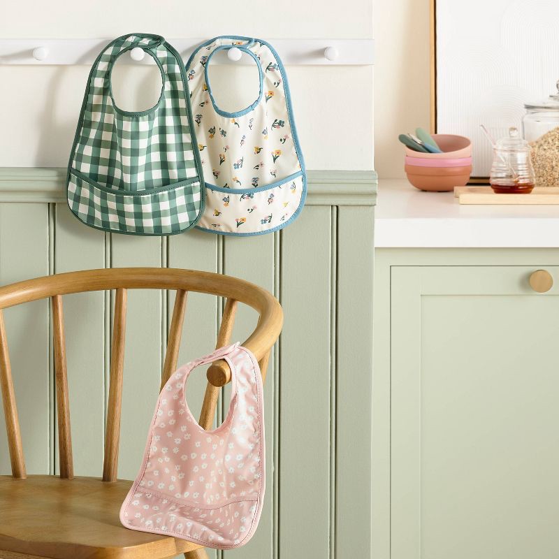 slide 2 of 4, Water Resistant Bibs - 3pk - Floral/Checkerboard - Cloud Island™, 3 ct