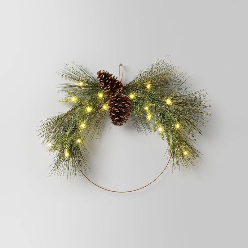 slide 1 of 4, 22" Pre-lit Gold Metal Hoop with Glittered Greenery and Pinecones Artificial Christmas Wreath Warm White LED Lights - Wondershop™, 1 ct