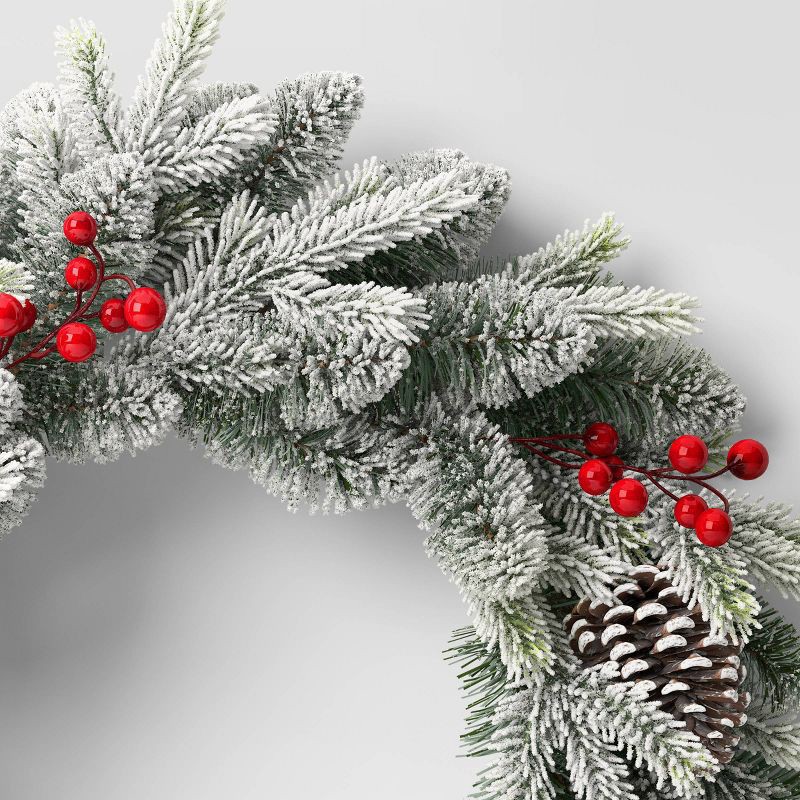 slide 3 of 3, 24" Lightly Flocked Pine Artificial Christmas Wreath with Pinecones and Red Berries Green - Wondershop™, 1 ct
