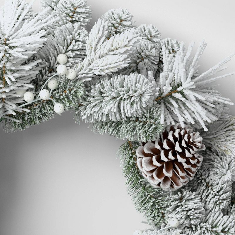 slide 3 of 3, 28" Flocked Mixed Greenery with Berries and Pinecones Artificial Christmas Wreath - Wondershop™, 1 ct