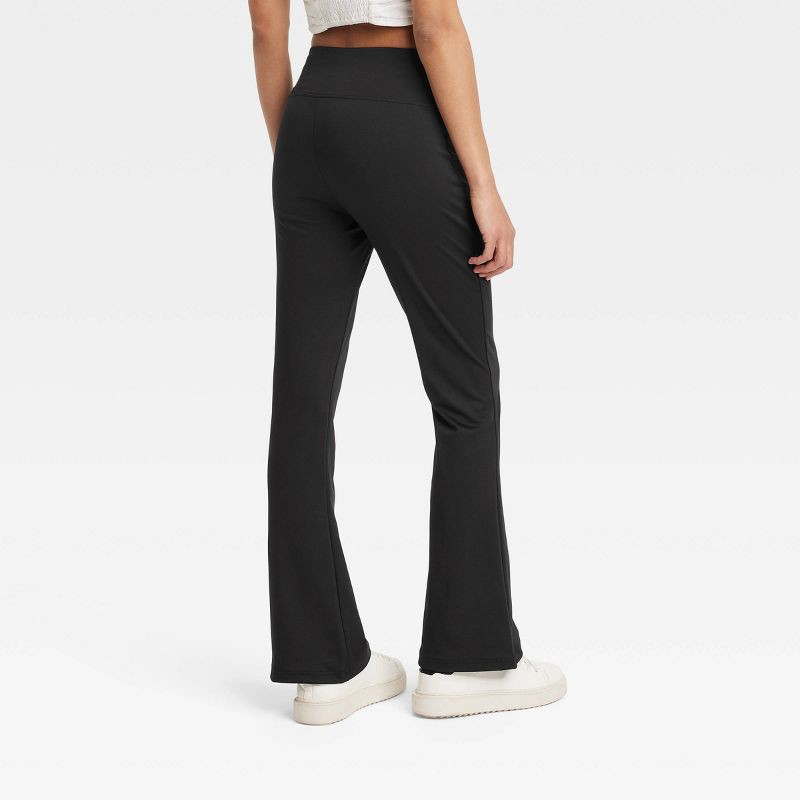 slide 2 of 3, Women's High Waisted Flare Leggings with Ruched Waistband - A New Day™ Black M: Midweight Stretch Jersey, 1 ct