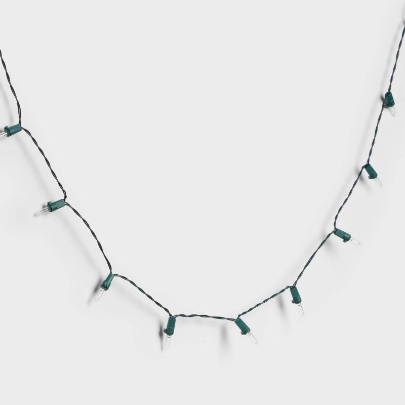 slide 3 of 5, 50ct Solar LED Christmas Indoor Outdoor Mini String Lights Warm White with Green Wire - Wondershop™, 50 ct