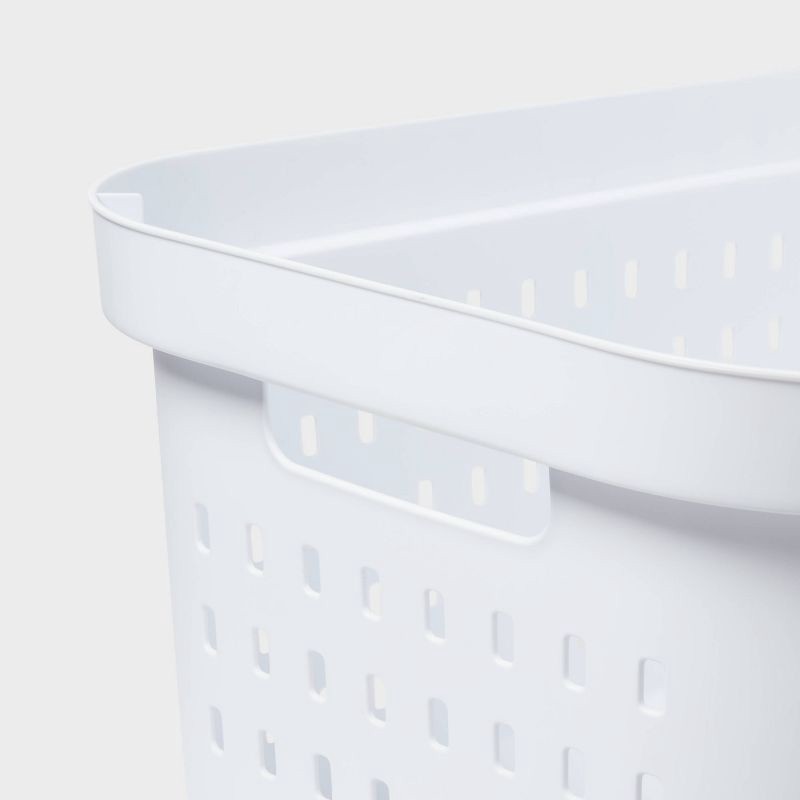 slide 3 of 7, 1.5bu Rectangle Modern Laundry Basket - Brightroom™: White Plastic Clothes Basket with Built-In Handles, Medium Size, 1 ct