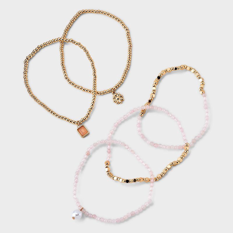 slide 3 of 4, Beaded Stretch Charm Bracelet w Semi Precious Rose Quartz Set 5pc - Universal Thread™ Gold/Pink: Multicolored Stretch Band, Recycled Zinc, 5 ct