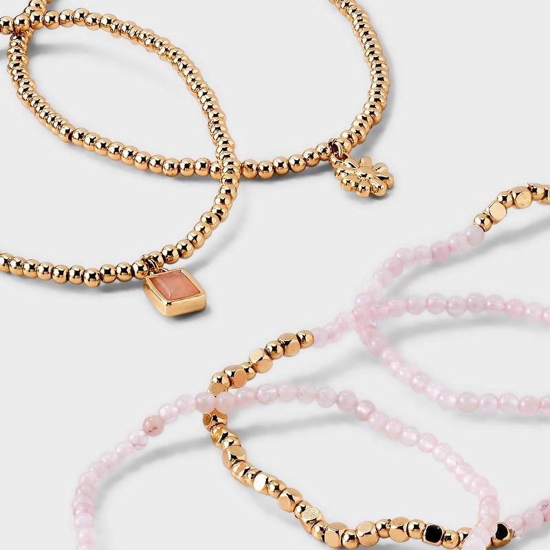 slide 4 of 4, Beaded Stretch Charm Bracelet w Semi Precious Rose Quartz Set 5pc - Universal Thread™ Gold/Pink: Multicolored Stretch Band, Recycled Zinc, 5 ct
