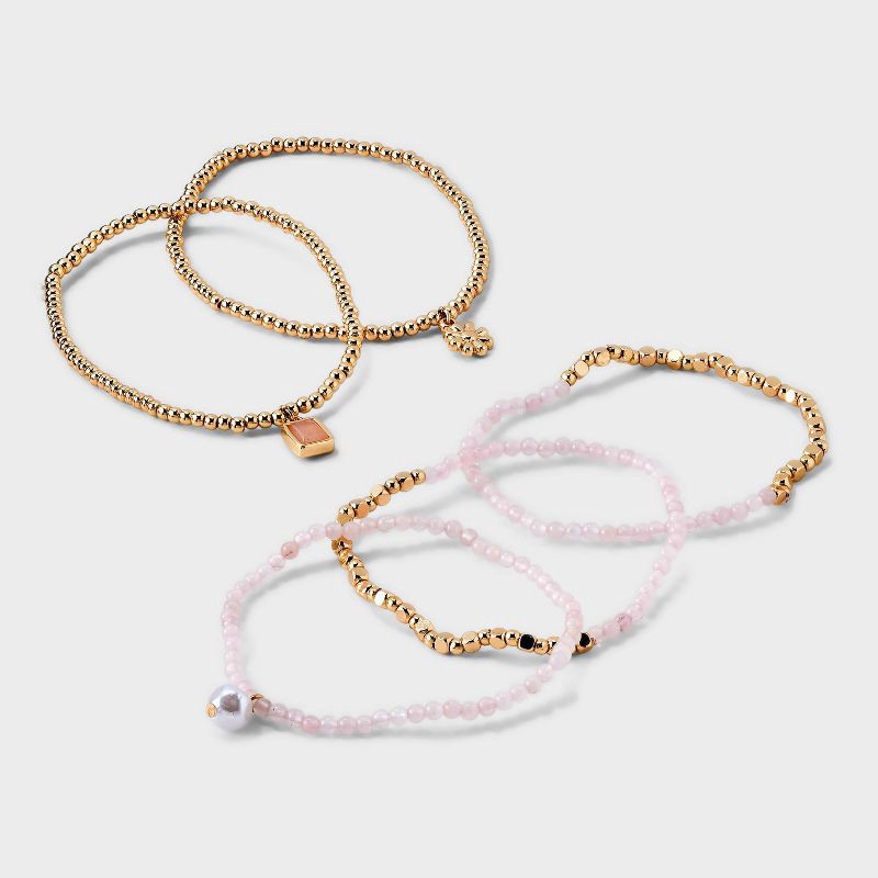 slide 1 of 4, Beaded Stretch Charm Bracelet w Semi Precious Rose Quartz Set 5pc - Universal Thread™ Gold/Pink: Multicolored Stretch Band, Recycled Zinc, 5 ct