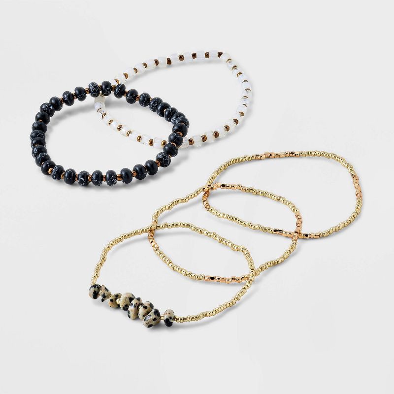 slide 1 of 4, Mixed Semi-Precious Black Howlite Cylinder Beaded Bracelet Set 5pc - Universal Thread™ Gold/Black: Glass, Brass, Acrylic, 5 ct