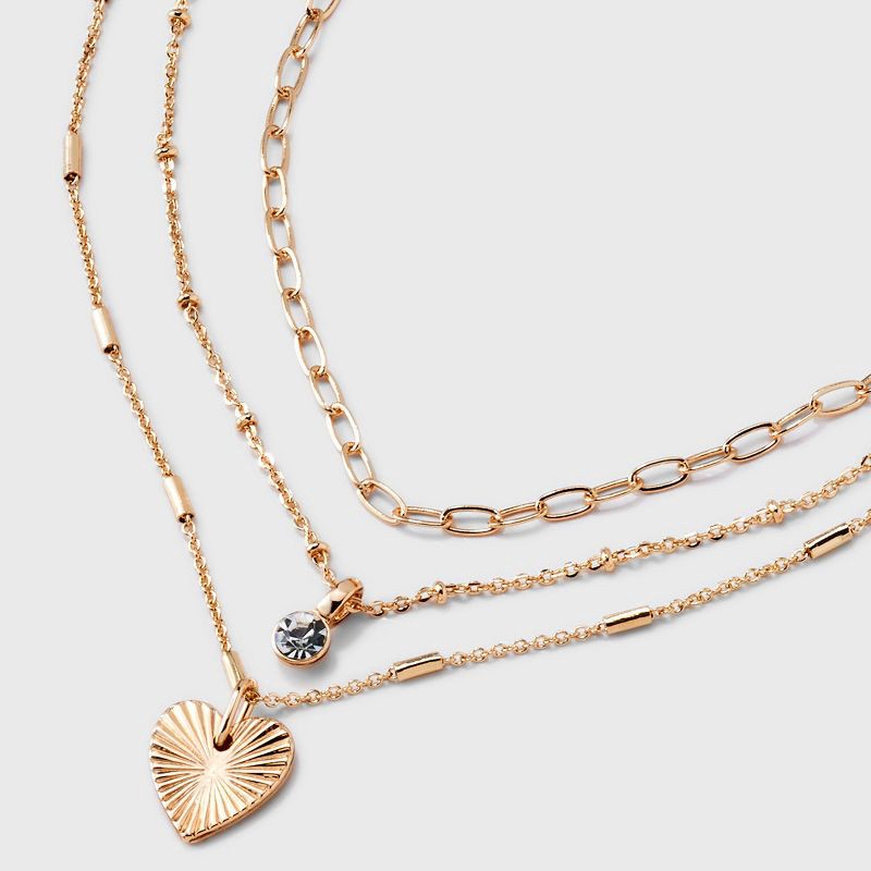slide 4 of 4, Valentine's Day Gold 3 Row With Textured Heart Necklace - A New Day™ Gold: Nickel-Free Multi-Strand Jewelry, 1 ct