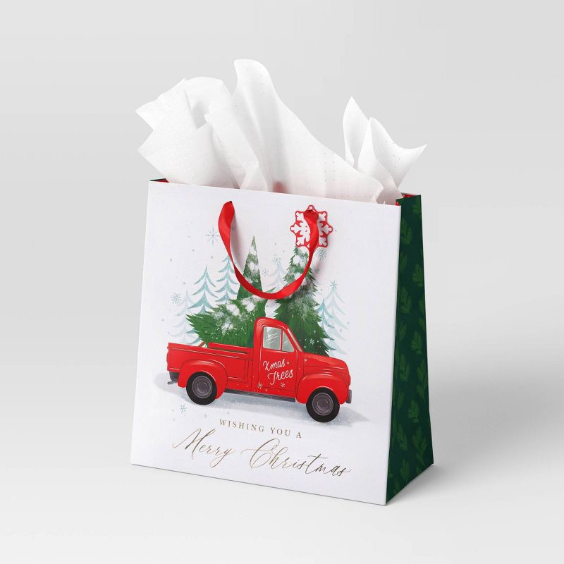 slide 2 of 3, Truck with Trees Large Square Christmas Gift Bag White - Wondershop™, 1 ct