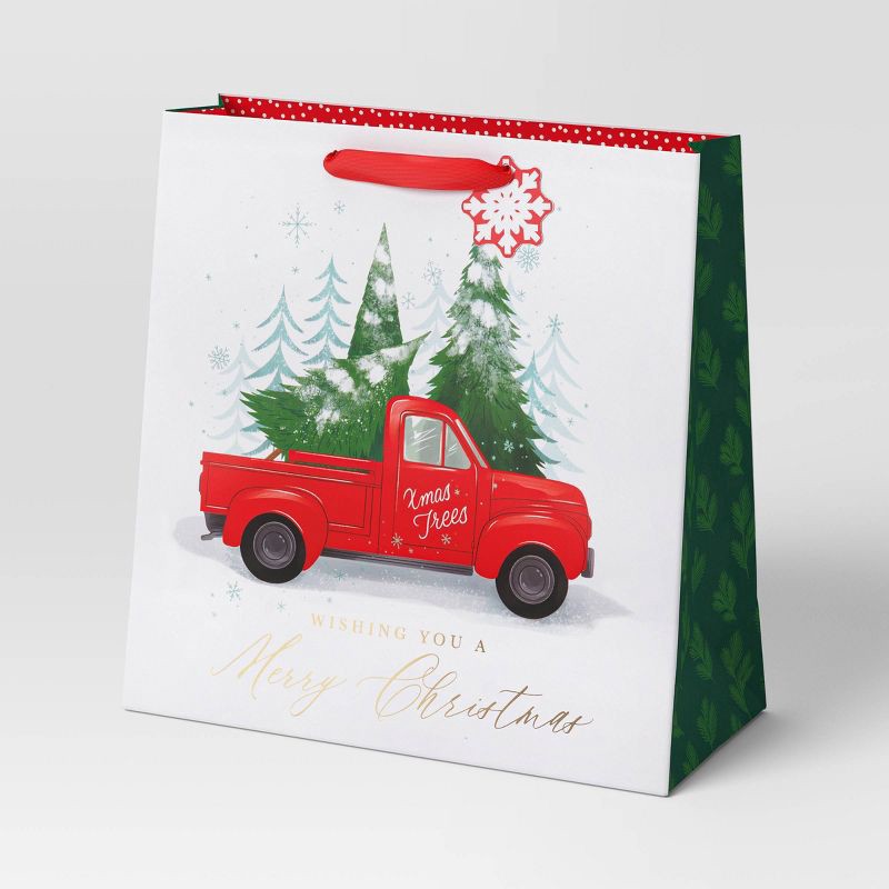 slide 1 of 3, Truck with Trees Large Square Christmas Gift Bag White - Wondershop™, 1 ct