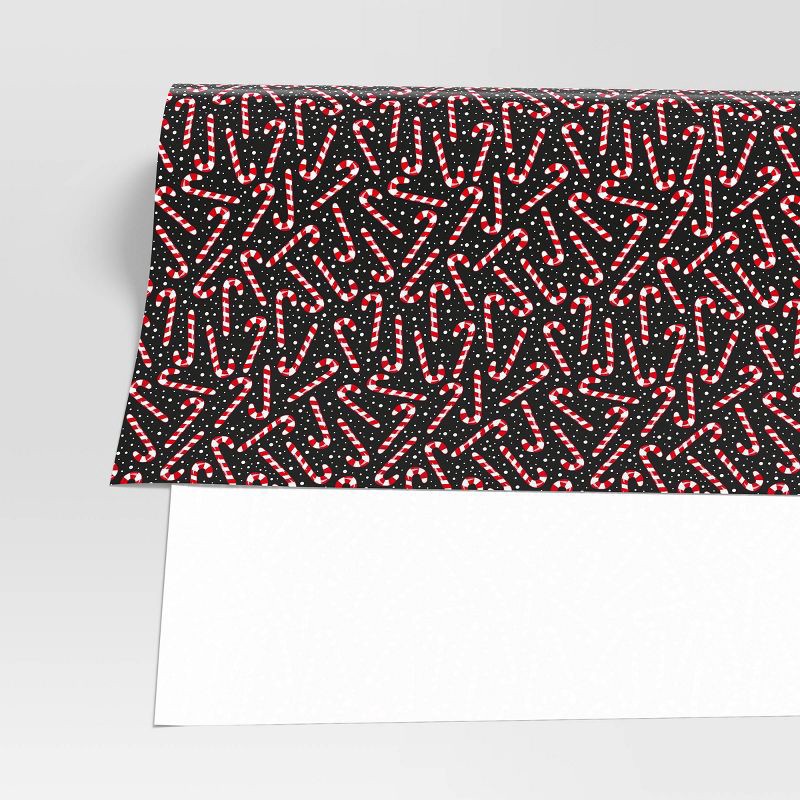 slide 3 of 3, 50 sq ft Candy Cane Christmas Gift Wrap Black - Wondershop™, 50 sq ft