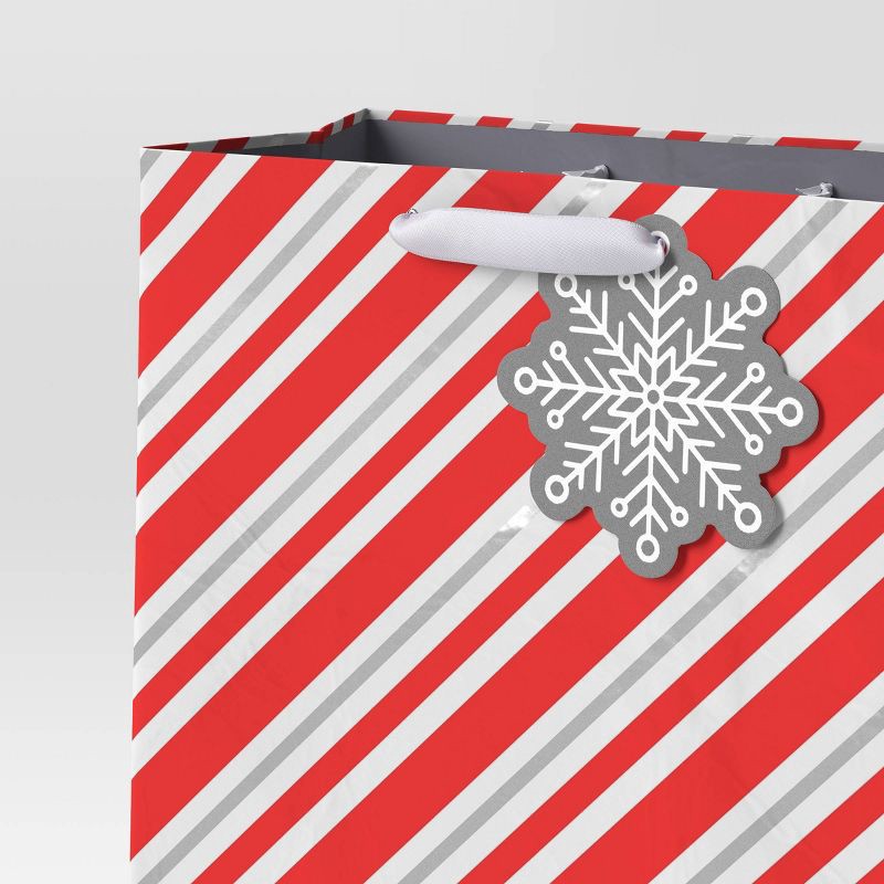 slide 3 of 3, Diagonal Stripe Cub Christmas Gift Bag Red - Wondershop™, 1 ct