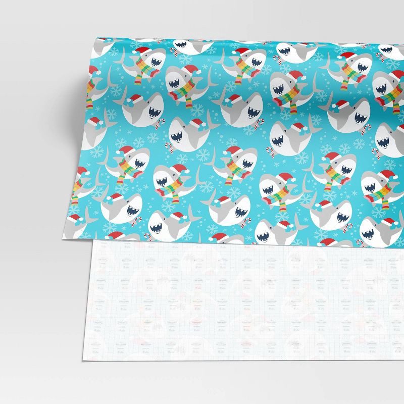 slide 3 of 3, 50 sq ft Shark Christmas Gift Wrap Blue - Wondershop™, 50 sq ft