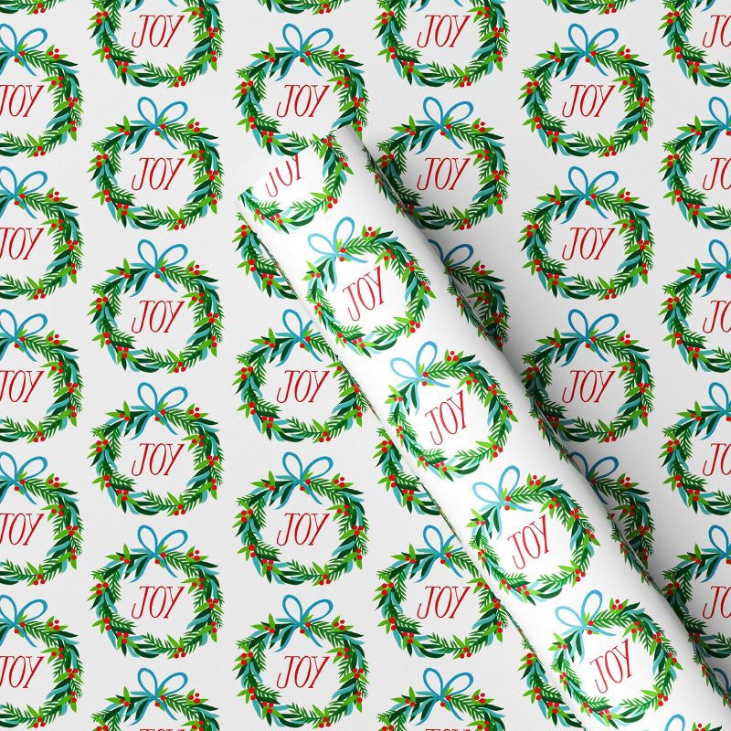 slide 1 of 3, 50 sq ft 'Joy' Wreath Christmas Gift Wrap White - Wondershop™, 50 sq ft