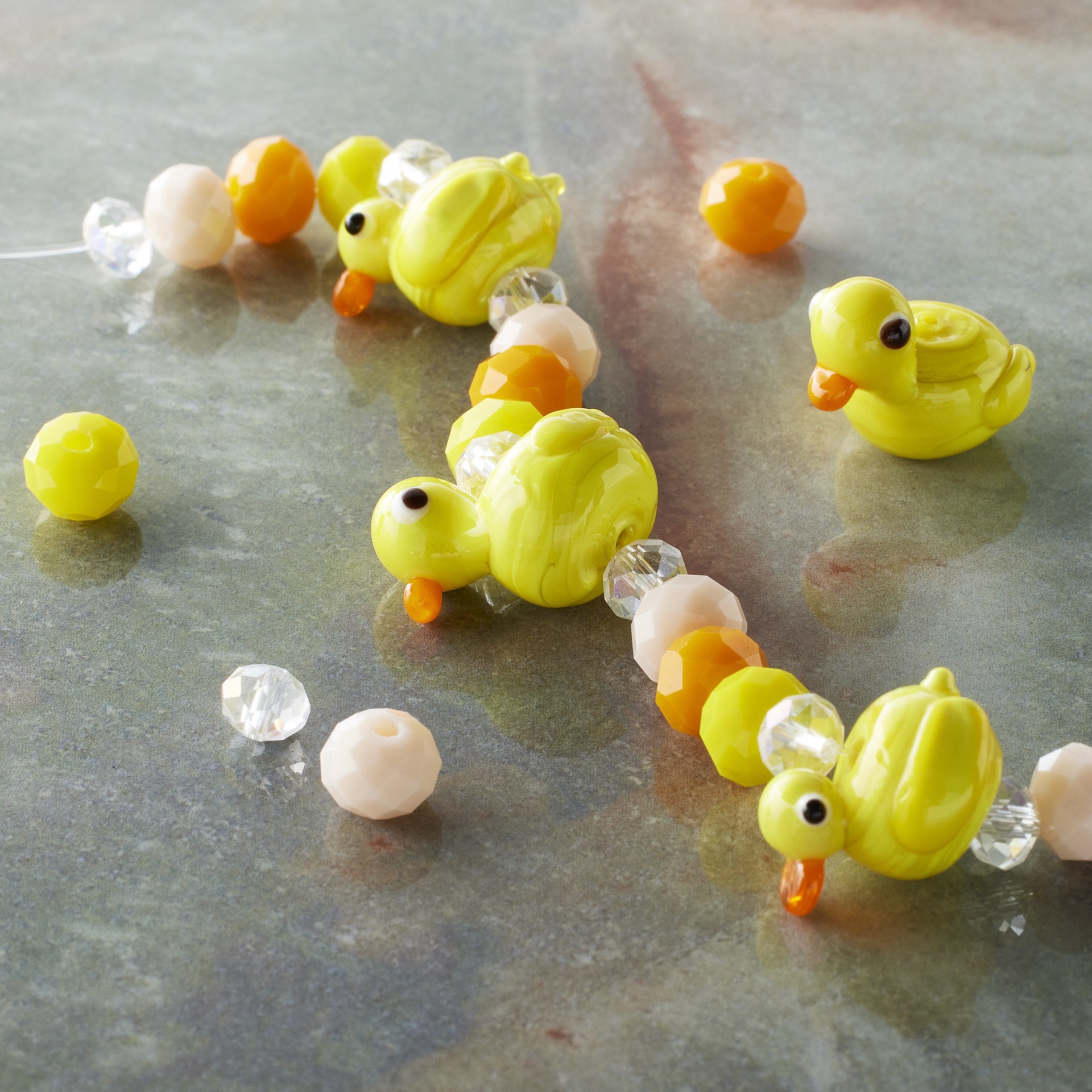 slide 3 of 3, Yellow Duck Lampwork Glass Bead Mix By Bead Landing, 12mm x 16mm
