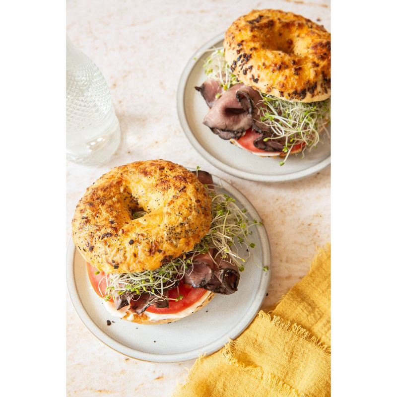 slide 4 of 5, Franz Seattle International Sourdough Cheese Onion Garlic Bagel, 1 ct