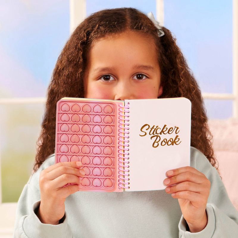 slide 4 of 7, Our Generation Finley 18" Doll with 50+ Stickers & Sticker Book Set: Fashion and Beauty, Light Brown Hair, Purple Eyes, 1 ct