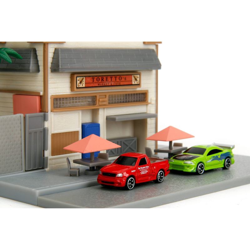 slide 9 of 14, Universal Fast and Furious Hollywood Rides Nanoscene - Toretto's Market & Cafe Vehicle Playset: Toy Vehicle Set with 2 Cars, Plastic, 1 ct