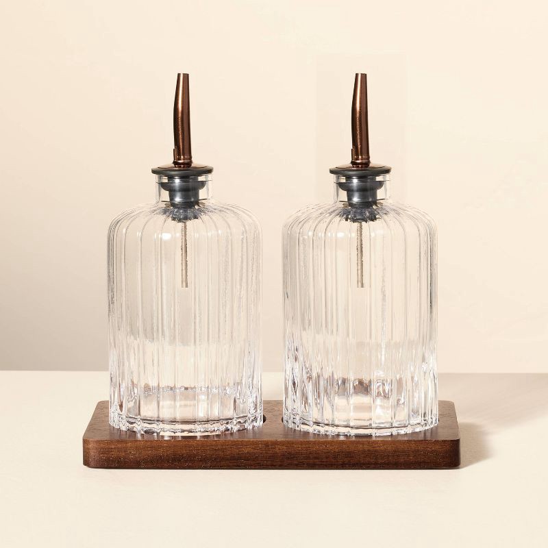 slide 1 of 3, Hearth & Hand with Magnolia Oil & Vinegar Ribbed Glass Bottle Set with Wood Base - Hearth & Hand™ with Magnolia, 1 ct