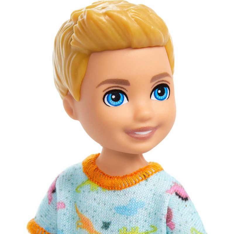 slide 2 of 6, Barbie 6.3" Chelsea Small Boy Doll Blond Hair/Blue Eyes Wearing Removable One-Piece with Dino Print, 1 ct