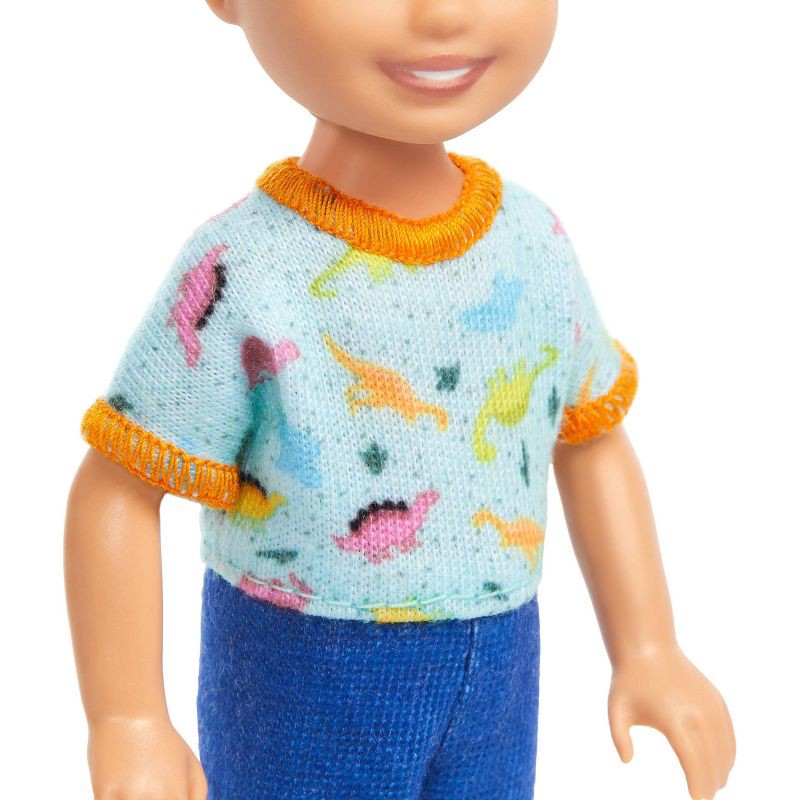 slide 3 of 6, Barbie 6.3" Chelsea Small Boy Doll Blond Hair/Blue Eyes Wearing Removable One-Piece with Dino Print, 1 ct
