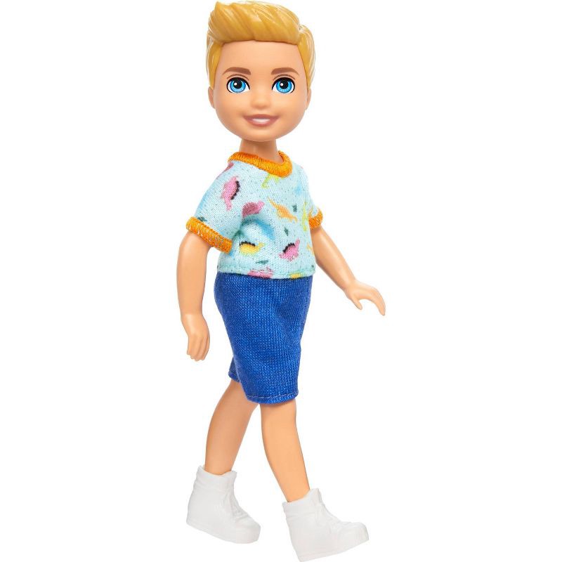 slide 5 of 6, Barbie 6.3" Chelsea Small Boy Doll Blond Hair/Blue Eyes Wearing Removable One-Piece with Dino Print, 1 ct