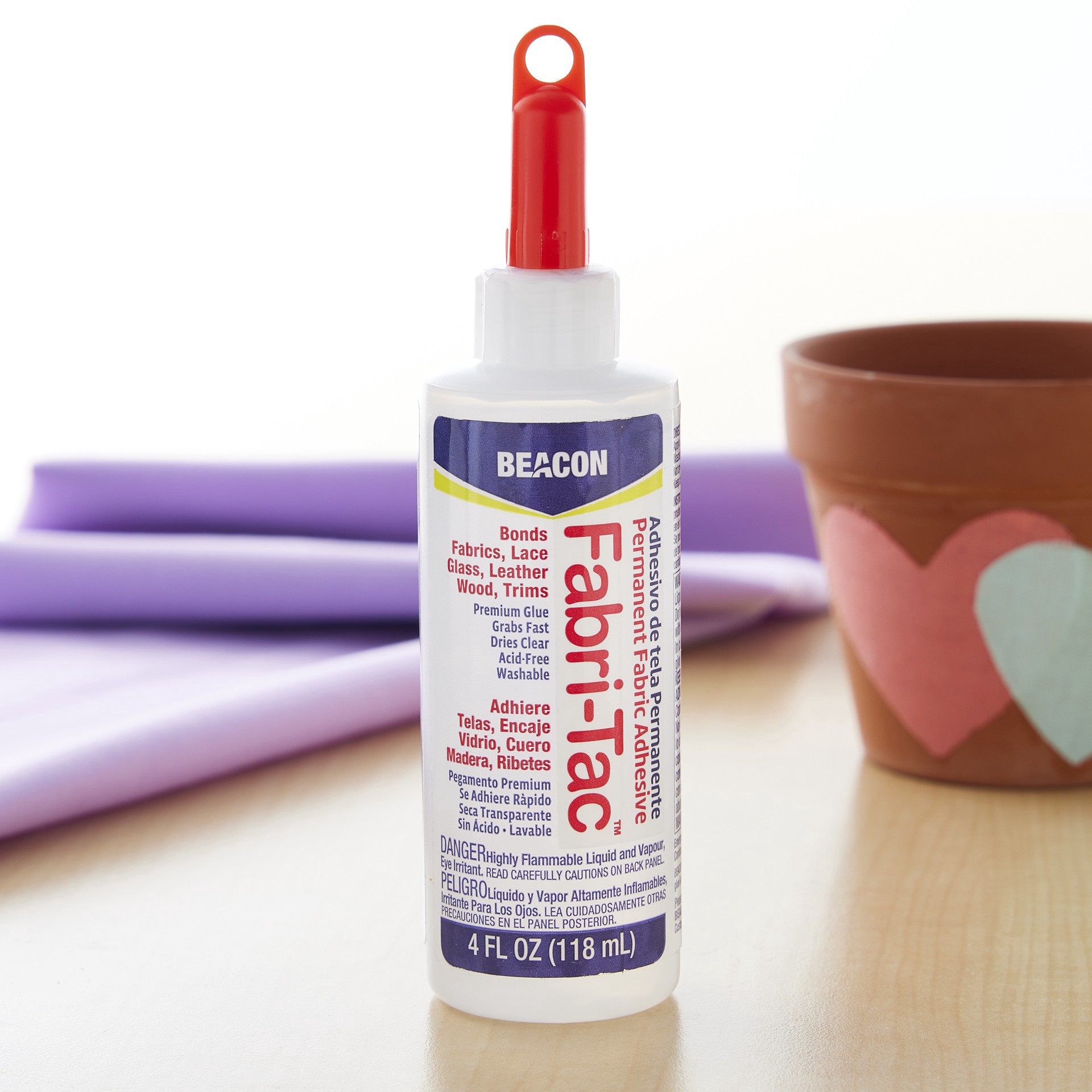 slide 3 of 3, Fabri-Tac Adhesive 4 Oz., 1 ct