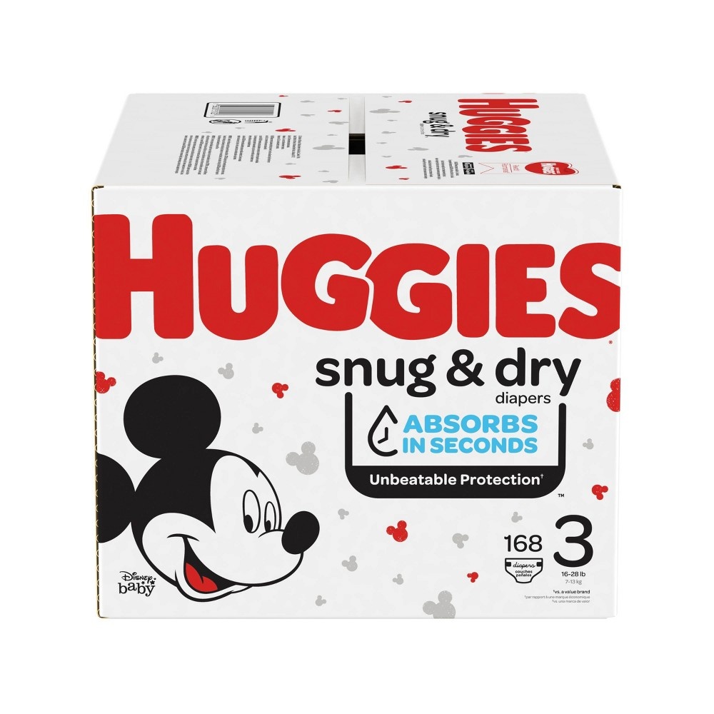 slide 2 of 5, Huggies Snug & Dry Disposable Diapers Huge Pack, 168 ct