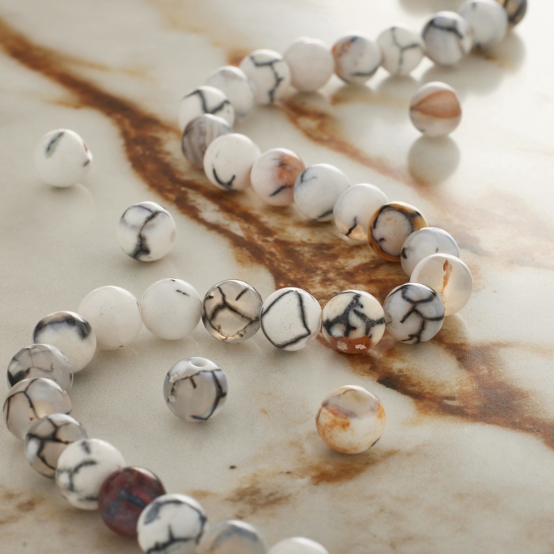 slide 2 of 3, Black & White Fire Agate Round Beads By Bead Landing, 6 mm