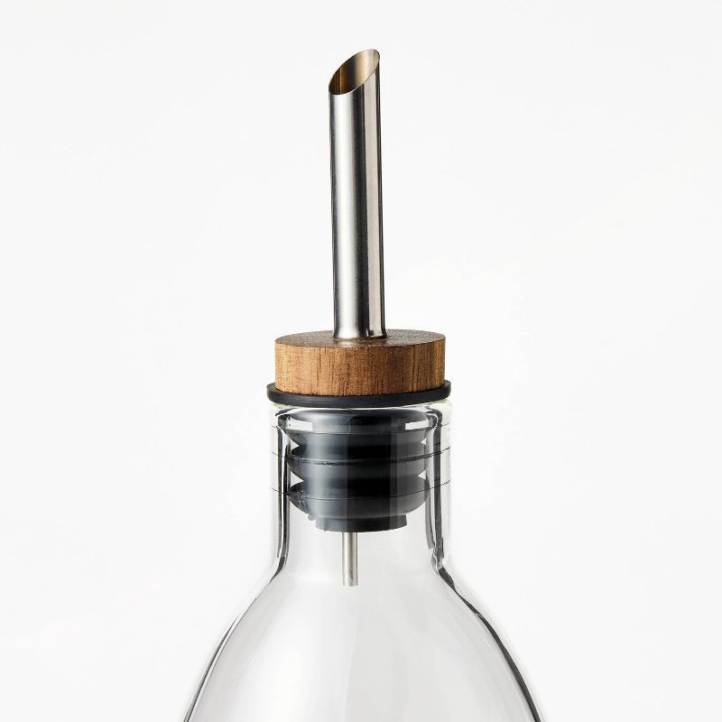 slide 3 of 3, Glass Olive Oil Bottle - Figmint™: Clear Glass Oil Dispenser with Stainless Steel & Silicone Lid, 20.5 oz Capacity, 20.5 oz