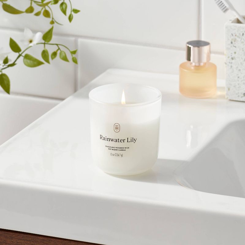 slide 2 of 3, Milky Glass Wooden Wick Rainwater Lily Jar Candle 8oz - Threshold™, 8 oz