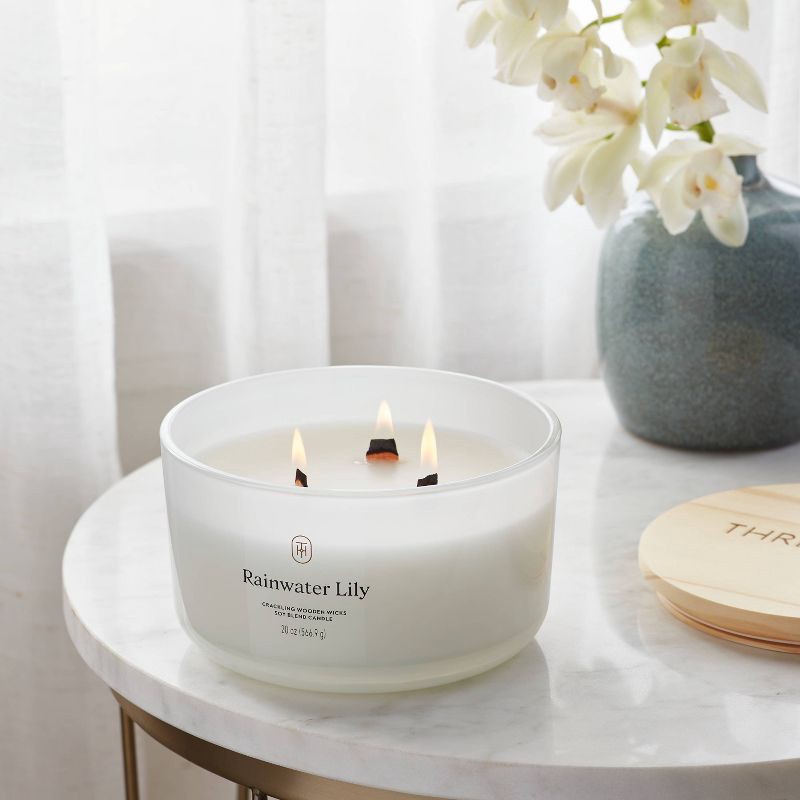 slide 2 of 3, 3-Wick Milky Glass Wooden Wick Rainwater Lily Jar Candle 20oz - Threshold™, 20 oz