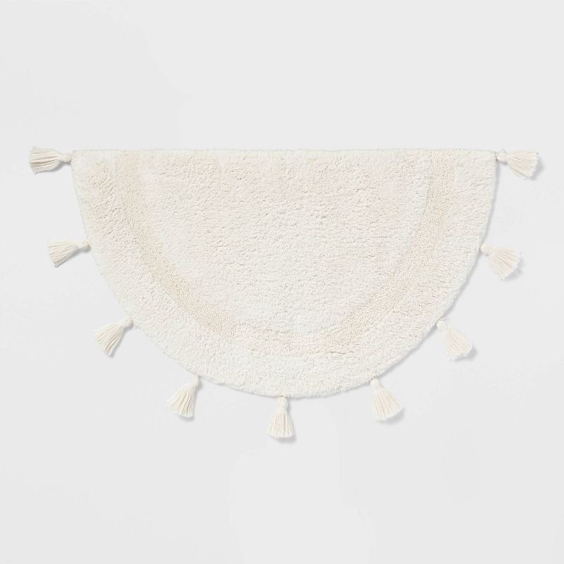 slide 1 of 4, 18"x32" Half Moon Bath Rug with Tassels Cream - Threshold™, 1 ct