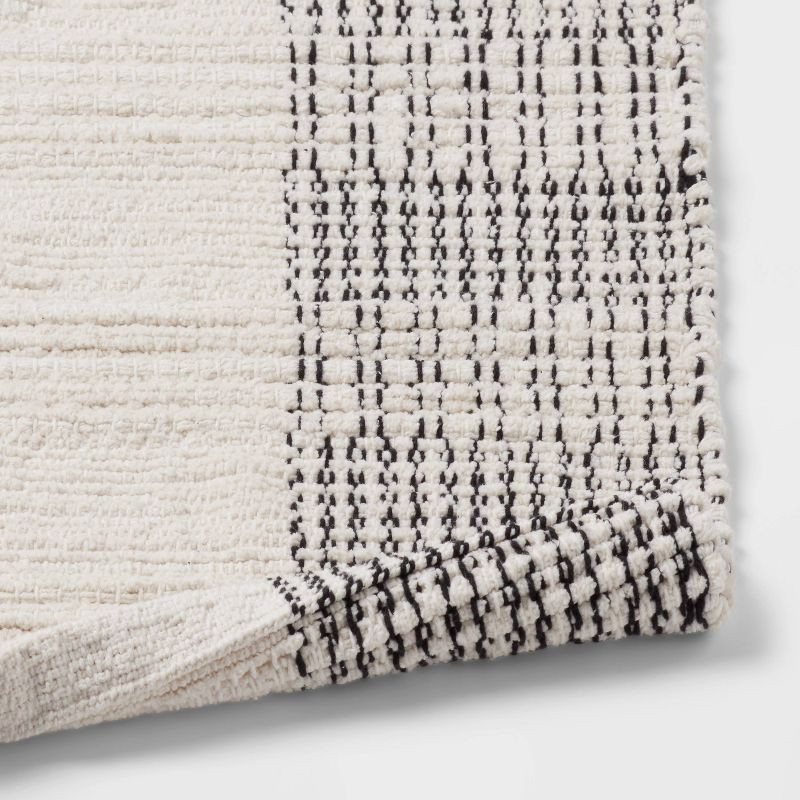 slide 4 of 4, 24"x36" Oversized Modern Chenille Bath Rug Black/White - Threshold™, 1 ct