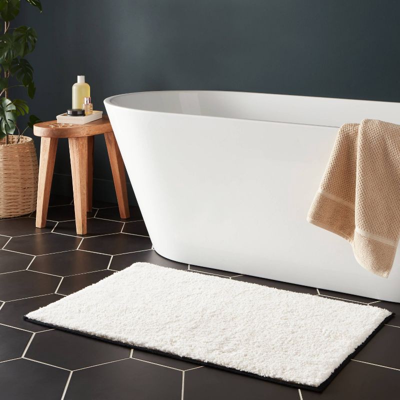 slide 2 of 4, 24"x36" Oversized Border Bath Rug Black/White - Threshold™, 1 ct