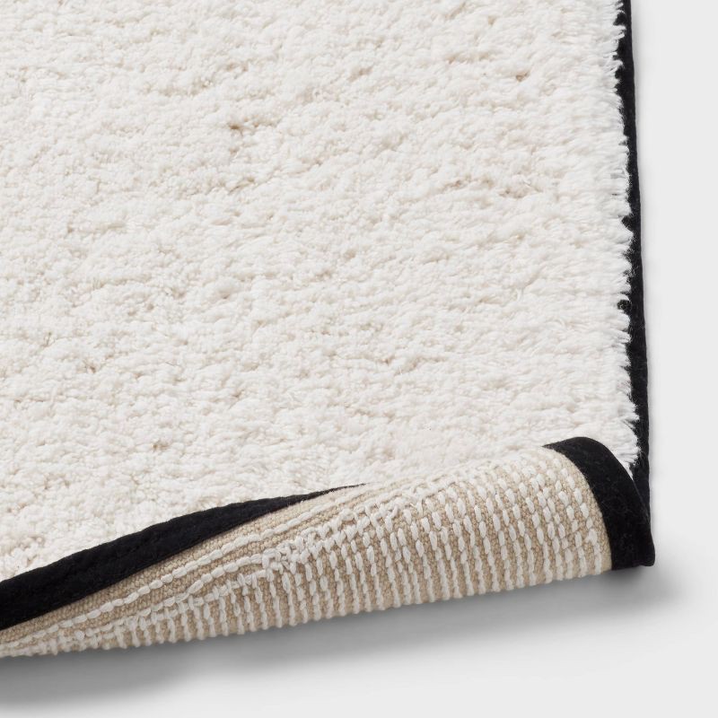 slide 4 of 4, 24"x36" Oversized Border Bath Rug Black/White - Threshold™, 1 ct