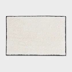 24"x36" Cut Pile Bath Rug Ivory wBlack Stitch Boarder - Threshold™